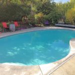 In-Ground Pool has in-line chlorinator and Automatic Security Pool Cover, rated for 285lb Static Load. Pool resurfaced 2015, new pump 2016.